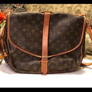 Louise Vuitton Saumur 35 Crossbody Bag.